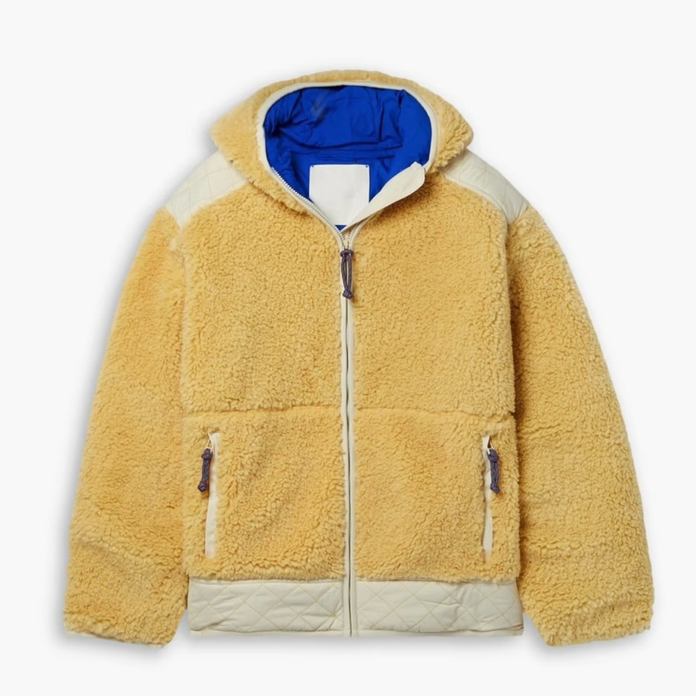 TORY BURCH
Hooded padded quilted shell-paneled fleece jacket